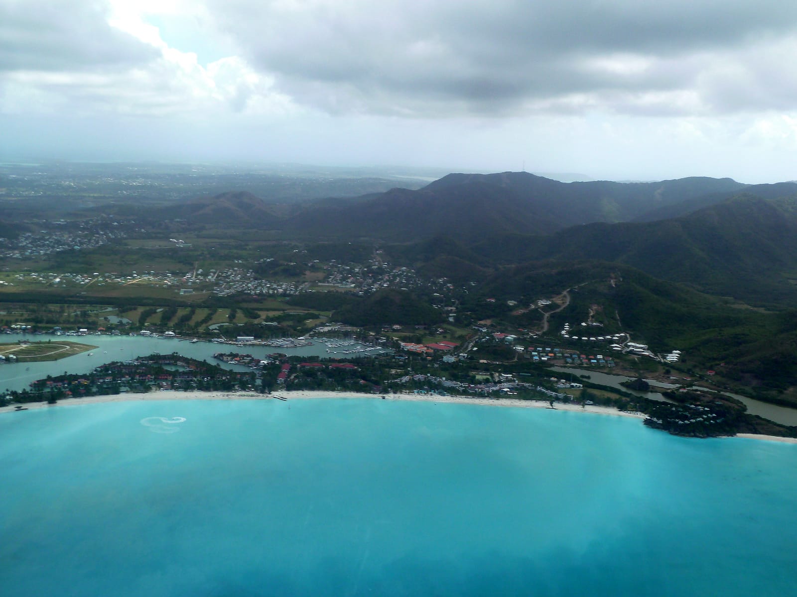 Marina, villas and beach at Jolly Harbour on Antigua’s west coast